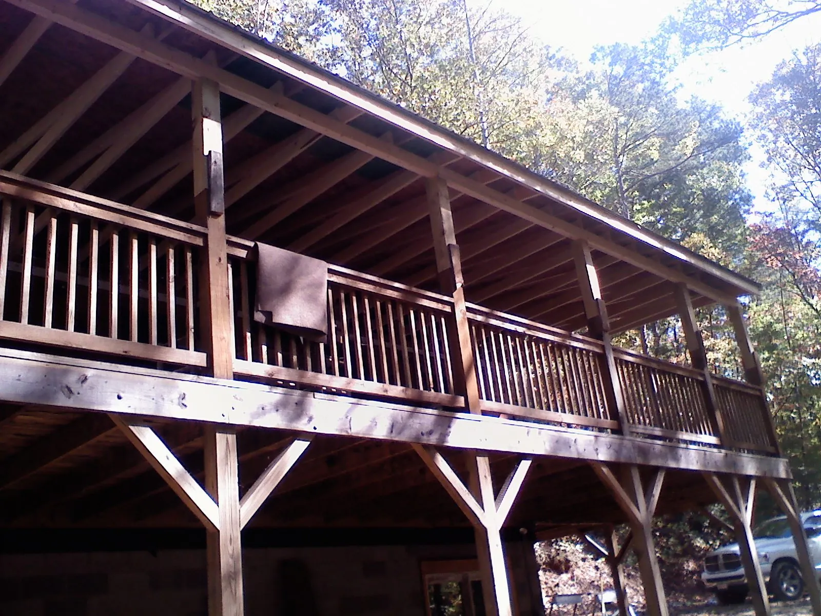 Timber framing under a new elevated porch and deck — Roof Leak Repair in Rome City by Roofing Brothers